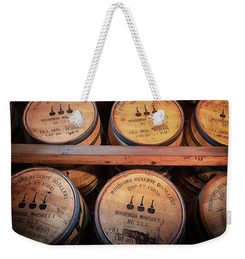 Bourbon Weekender Tote Bag featuring the photograph Bourbon Barrels in the Rick by Susan Rissi Tregoning