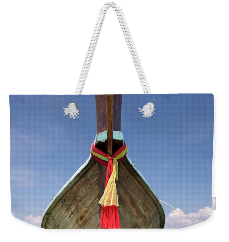 Andaman Sea Weekender Tote Bag featuring the photograph Bow Of A Long-tailed Boat, Thailand by Enviromantic