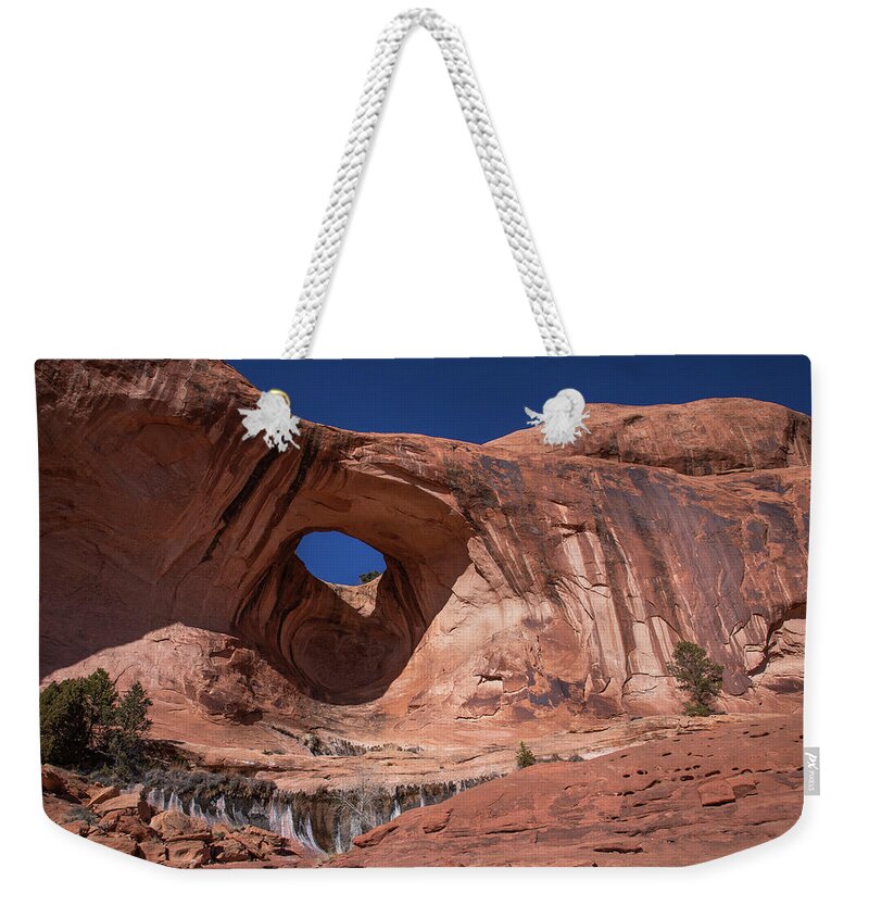  Weekender Tote Bag featuring the photograph Bowtie Arch by Dan Norris