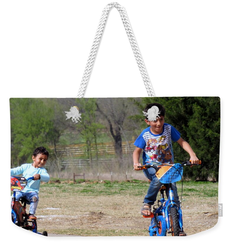 Bicycle Weekender Tote Bag featuring the photograph Boys on Bikes by Amy Hosp