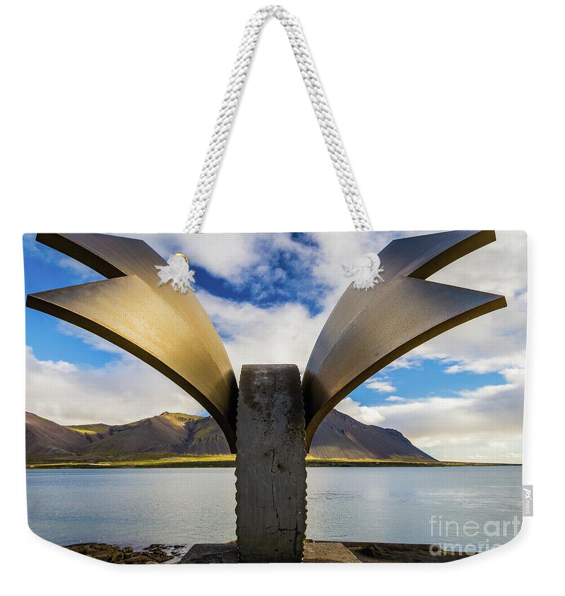 Brakin Weekender Tote Bag featuring the photograph Brakin monument, Borgarnes, Iceland by Lyl Dil Creations