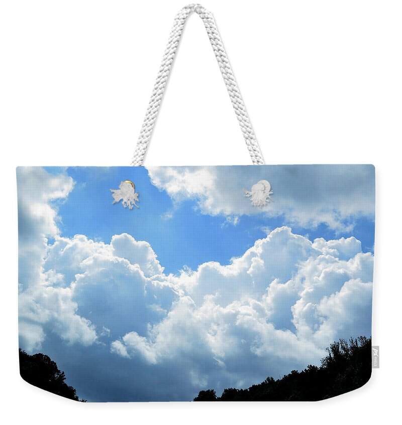 Clouds Weekender Tote Bag featuring the photograph Break in the Clouds by Linda Stern