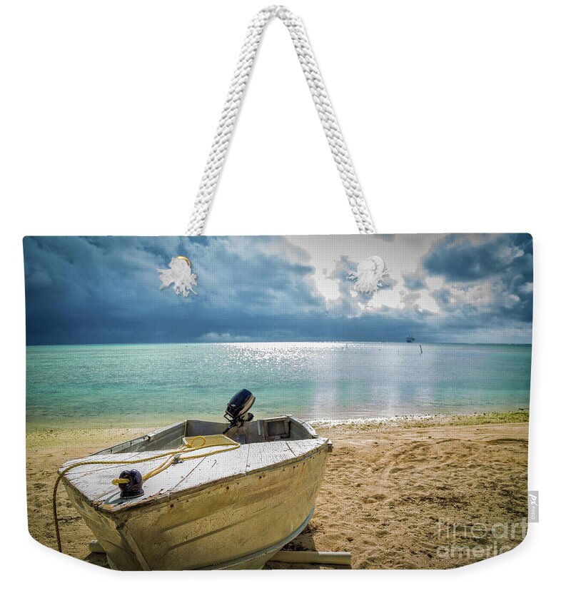 Cook Islands Weekender Tote Bag featuring the photograph Brewing by Becqi Sherman
