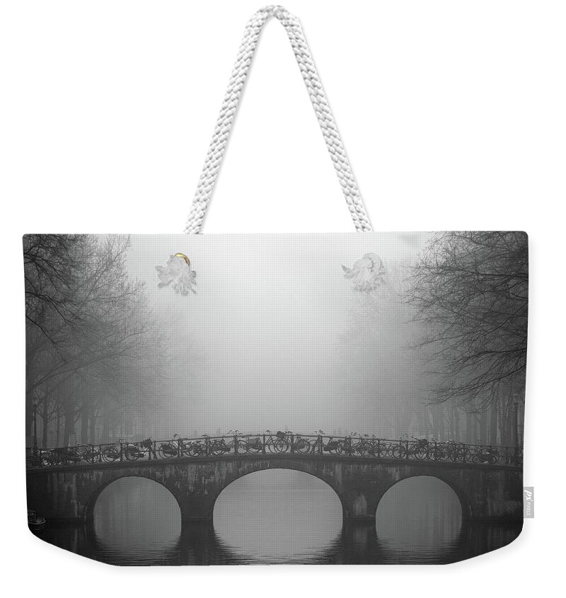 Tranquility Weekender Tote Bag featuring the photograph Bridge On Keizersgracht, Amsterdam by Cultura Exclusive/alex Holland