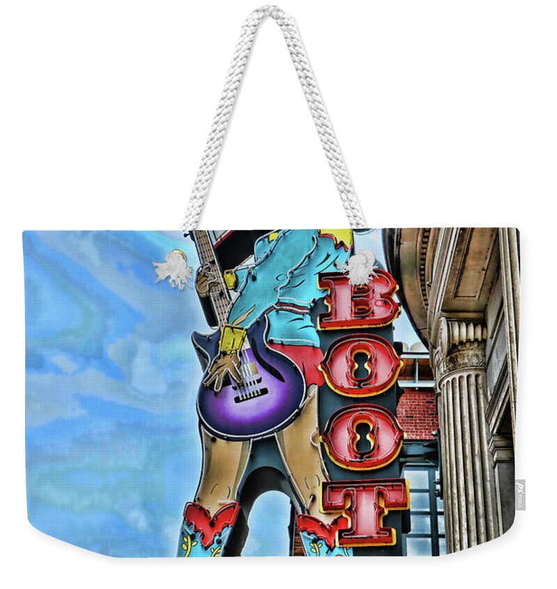 Nashville Weekender Tote Bag featuring the photograph Broadway Boot Company # 2 - Nashville by Allen Beatty