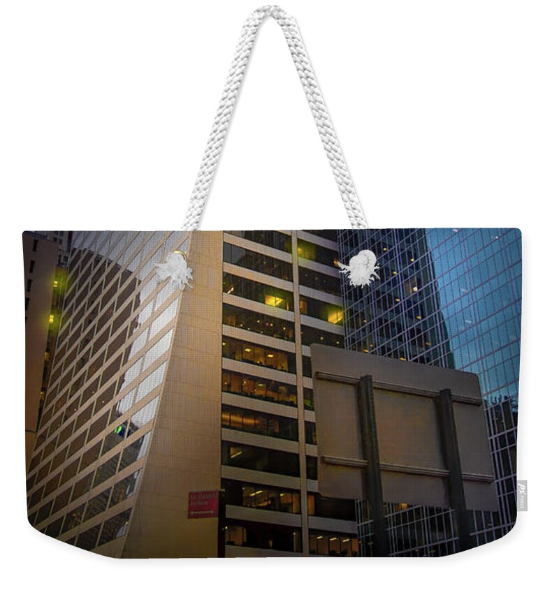 New York Weekender Tote Bag featuring the photograph Bryant Park Skyscraper by Mark Andrew Thomas