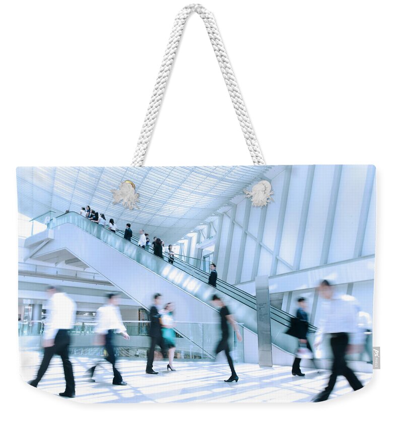 Crowd Weekender Tote Bag featuring the photograph Business People In Motion by Rawpixel