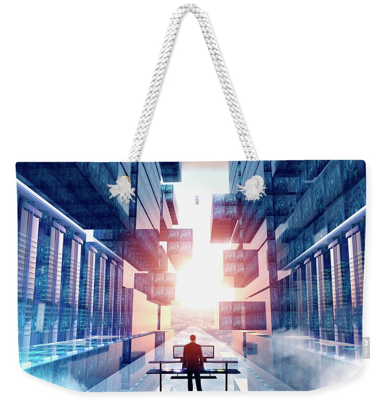 Working Weekender Tote Bag featuring the photograph Businessman Using Computer In Virtual by Colin Anderson Productions Pty Ltd
