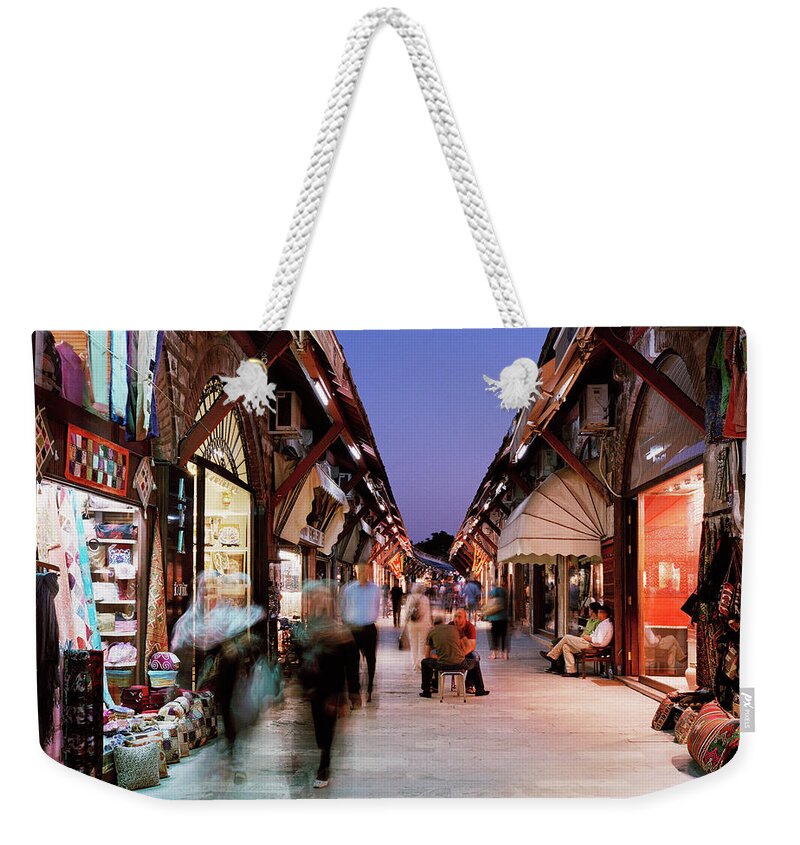 Istanbul Weekender Tote Bag featuring the photograph Busy Street Lined With Shops In Istanbul by Gary Yeowell