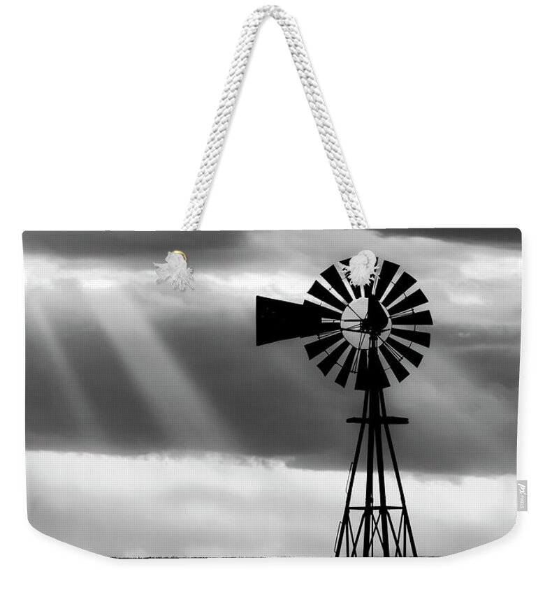 Kansas Weekender Tote Bag featuring the photograph BW Windmill and Crepuscular Rays -01 by Rob Graham