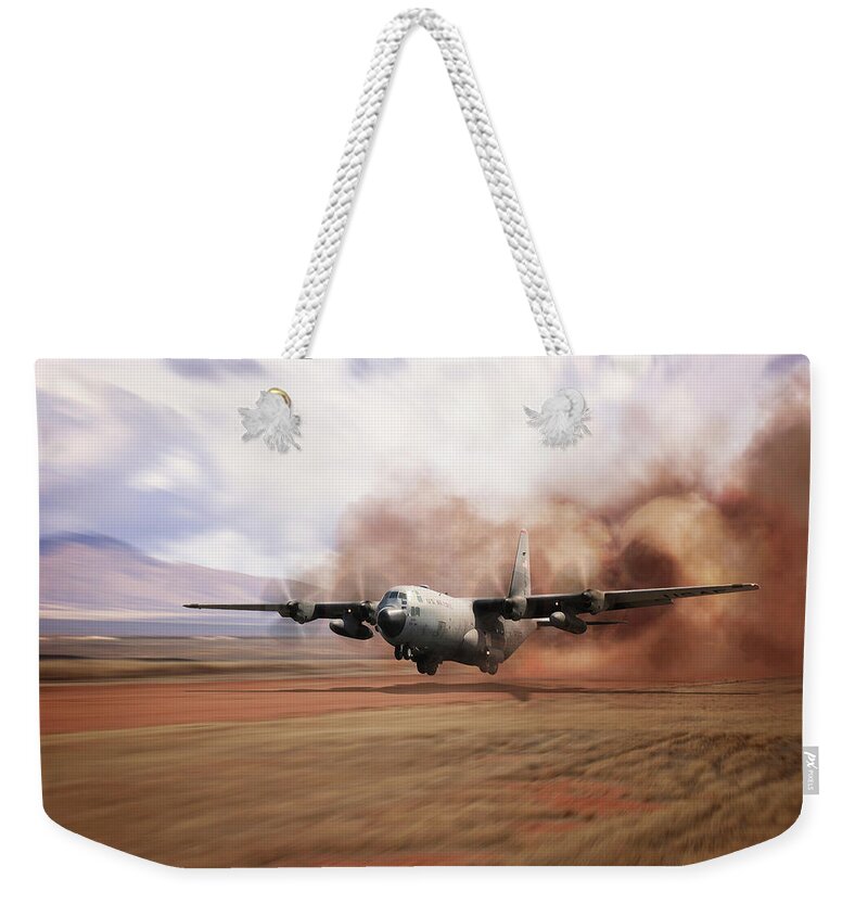 C-130 Hercules Weekender Tote Bag featuring the digital art C130 Dirt Strip Landing by Airpower Art