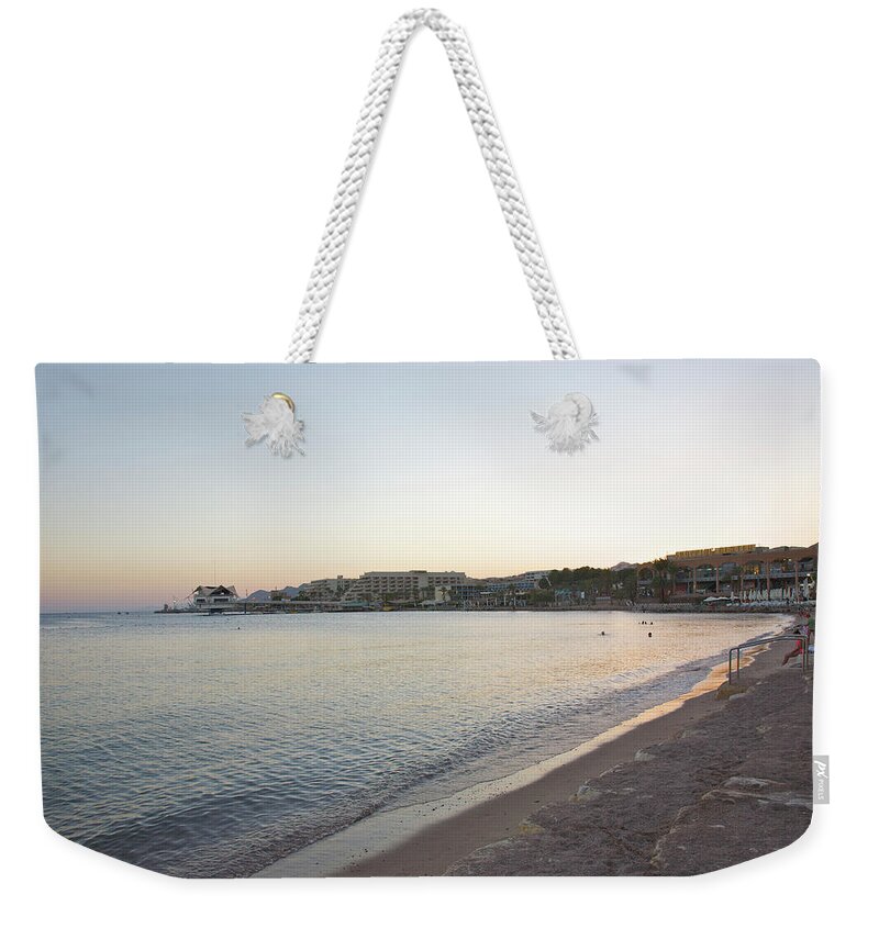 Tranquility Weekender Tote Bag featuring the photograph Calm Water Of Sea Near Beaches And by Barry Winiker