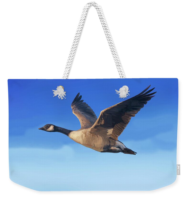 Creative Art Weekender Tote Bag featuring the digital art Canada Goose flying with blue sky above by Mark Miller