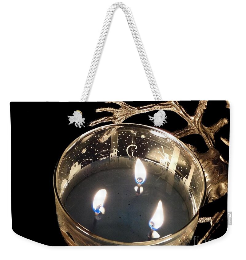 Candle Weekender Tote Bag featuring the photograph Candle Reflections by Joseph Baril