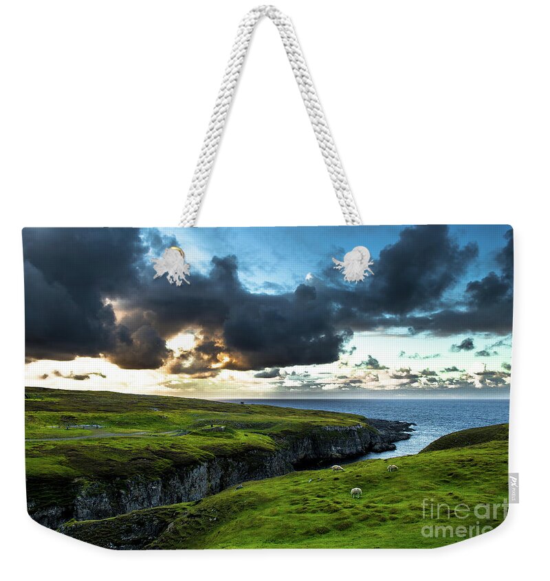 Scotland Weekender Tote Bag featuring the photograph Canyon To Smoo Cave With Flock Of Sheep At The Twilight Atlantic Coast Near Durness In Scotland by Andreas Berthold