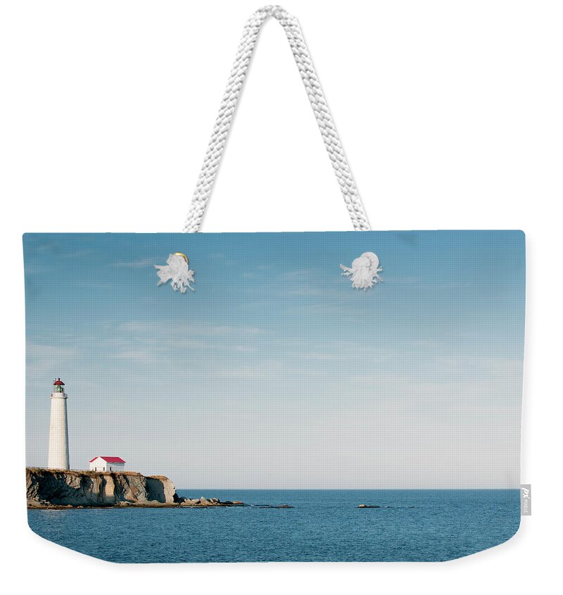 Scenics Weekender Tote Bag featuring the photograph Cap-des-rosiers Lighthouse by Westhoff