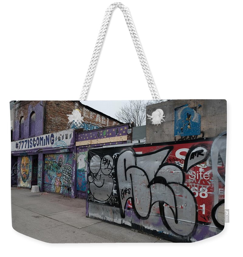 Urban Weekender Tote Bag featuring the photograph Cavity For A Decade by Kreddible Trout