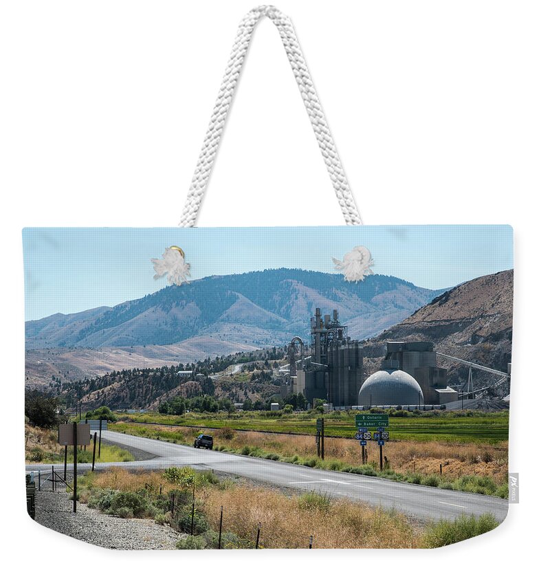 Cement Plant Space Port Weekender Tote Bag featuring the photograph Cement Plant Space Port by Tom Cochran