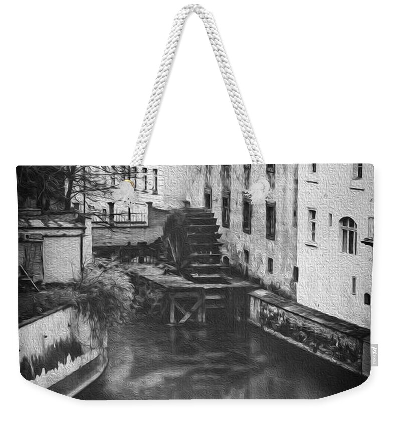 Prague Weekender Tote Bag featuring the photograph Certovka Canal and Old Water Wheel Prague in Black and White by Carol Japp
