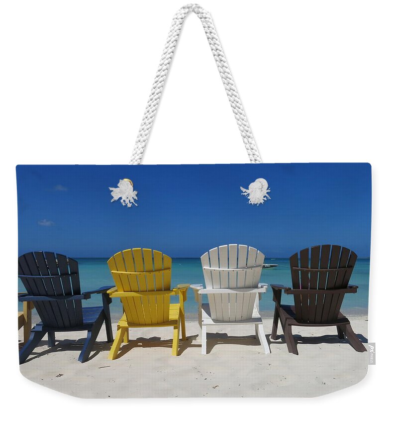 Aruba Weekender Tote Bag featuring the photograph Chairs On A Beach by Inge Elewaut