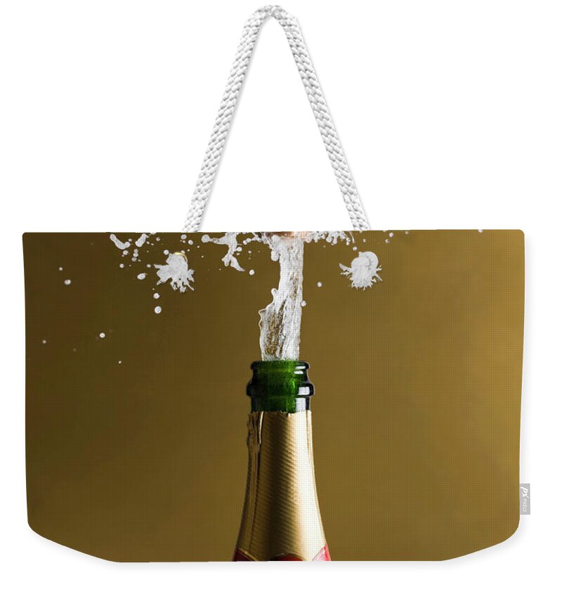 Alcohol Weekender Tote Bag featuring the photograph Champagne. Celebration Still Life by Syldavia