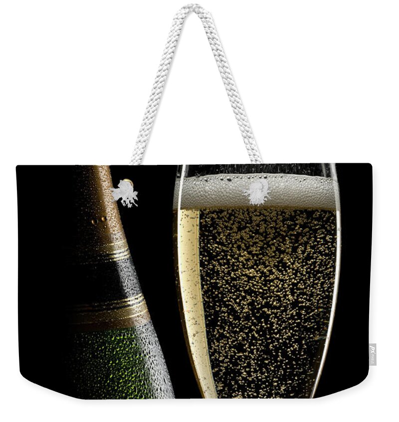Black Color Weekender Tote Bag featuring the photograph Champagne Still Life by Markswallow