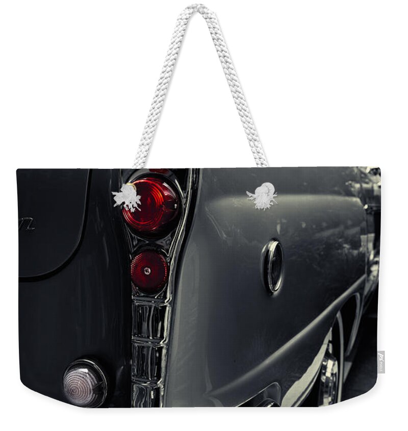 Car Weekender Tote Bag featuring the photograph Checker Marathon by Carrie Hannigan