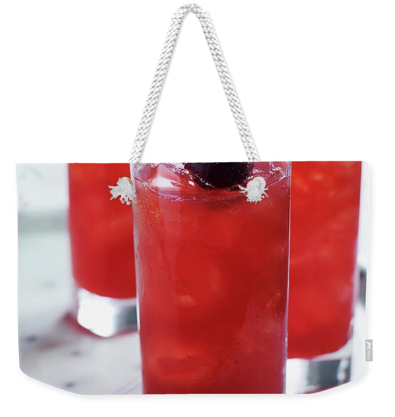 Cherry Weekender Tote Bag featuring the photograph Cherry Cocktail by Alexandra Grablewski
