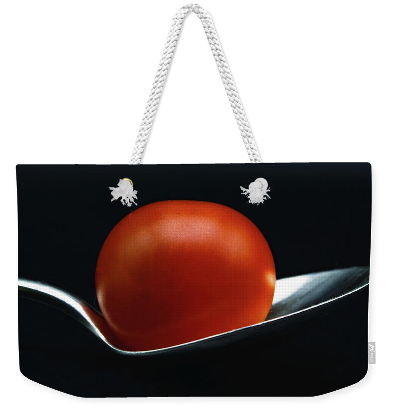 Food Weekender Tote Bag featuring the photograph Cherry Tomato by Silvia Marcoschamer