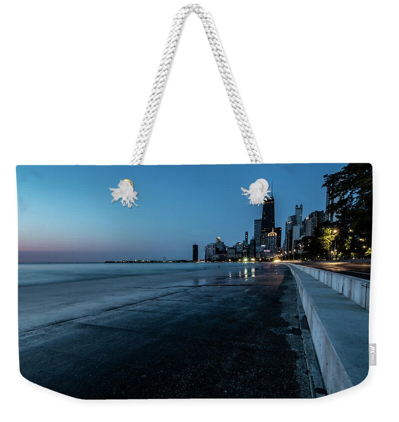Chicago Weekender Tote Bag featuring the photograph Chicago's lakefront at dawn by Sven Brogren