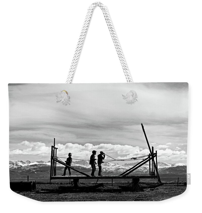 Ranch Weekender Tote Bag featuring the photograph Children at play by Julieta Belmont