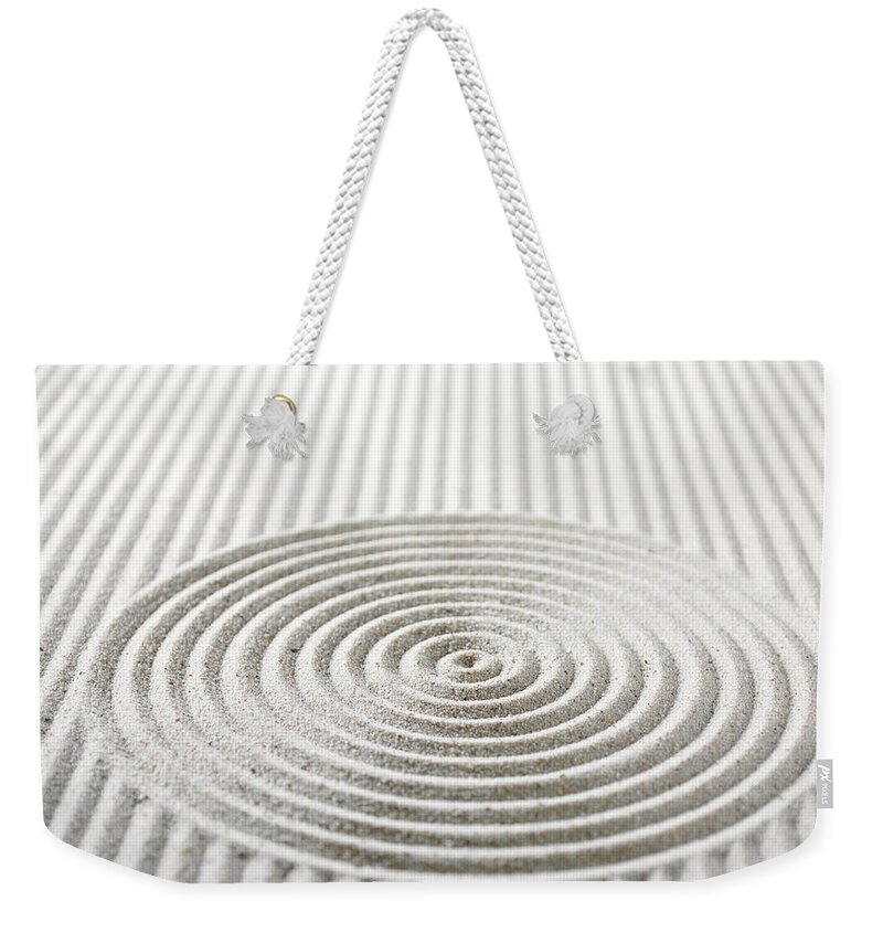 In A Row Weekender Tote Bag featuring the photograph Circles And Lines In Sand by Wragg