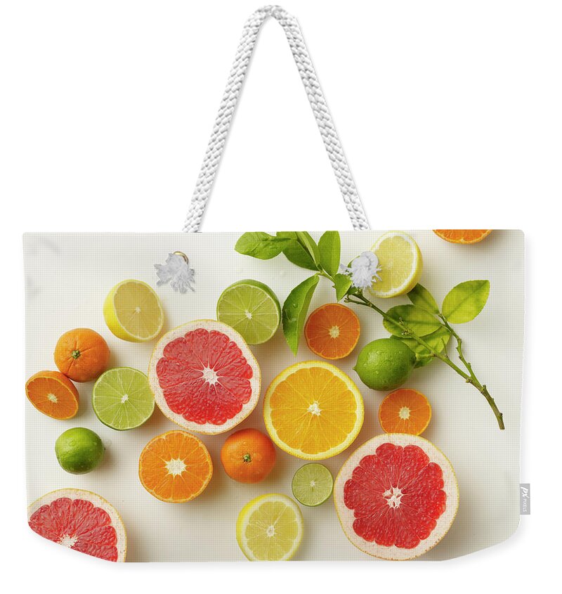 Orange Weekender Tote Bag featuring the photograph Citrus Variety by Carin Krasner