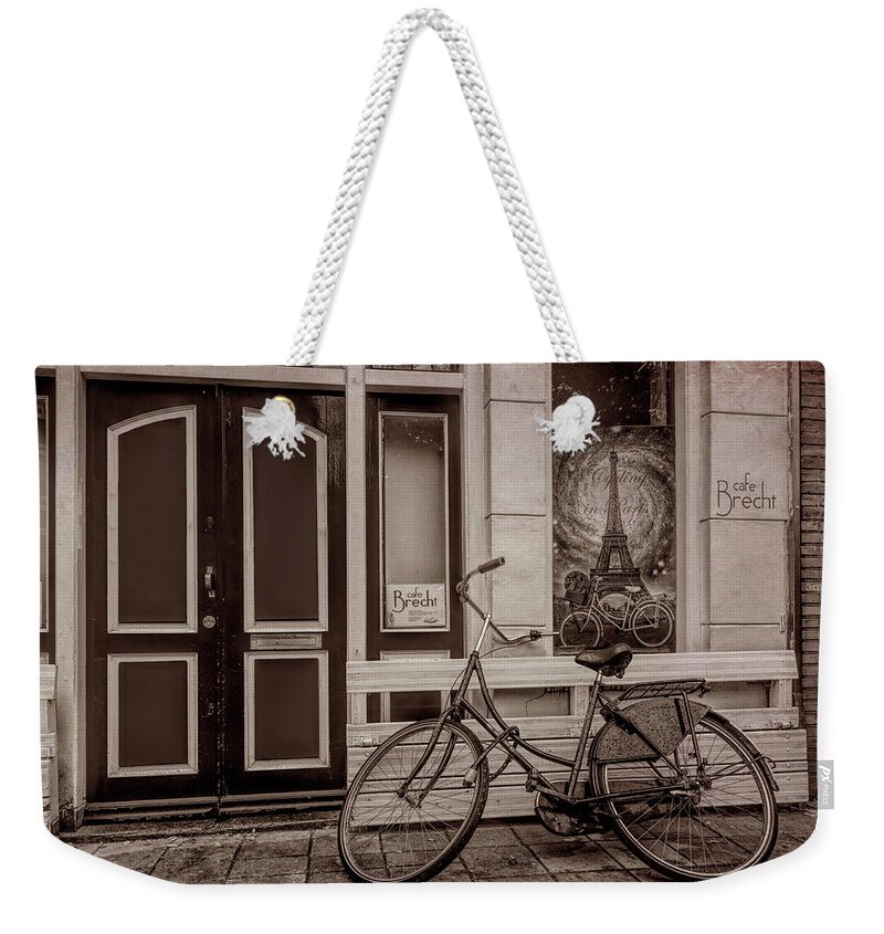 Amsterdam Weekender Tote Bag featuring the photograph City Bike Downtown in Sepia by Debra and Dave Vanderlaan