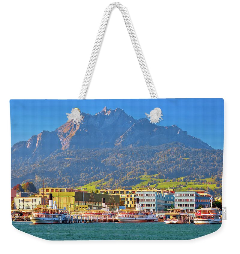 Lake Weekender Tote Bag featuring the photograph City of Luzern and Pilatus mountain view from lake by Brch Photography