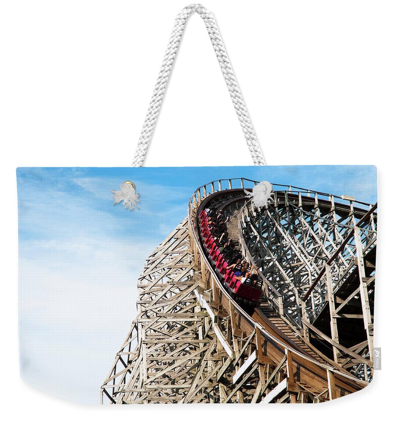 Rail Transportation Weekender Tote Bag featuring the photograph Classic Roller Coaster With People At by Awelshlad