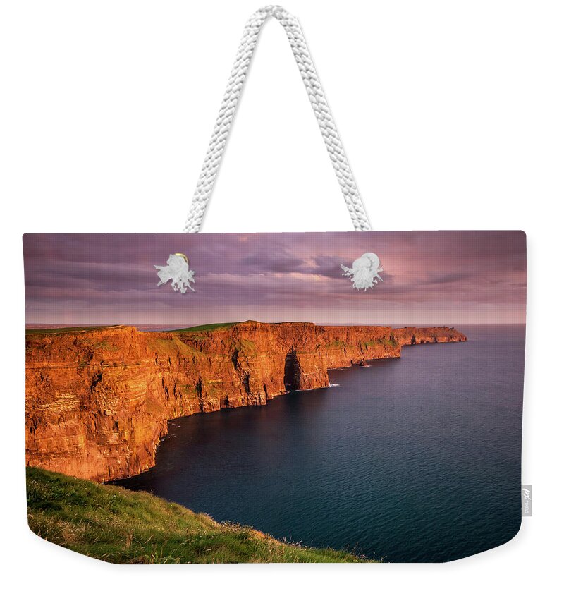 Scenics Weekender Tote Bag featuring the photograph Cliffs Of Moher, Ireland At Sunset by Pierre Leclerc Photography