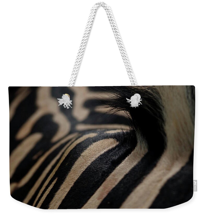 Animal Skin Weekender Tote Bag featuring the photograph Close-up View Of Zebra Skin by Ryan Green
