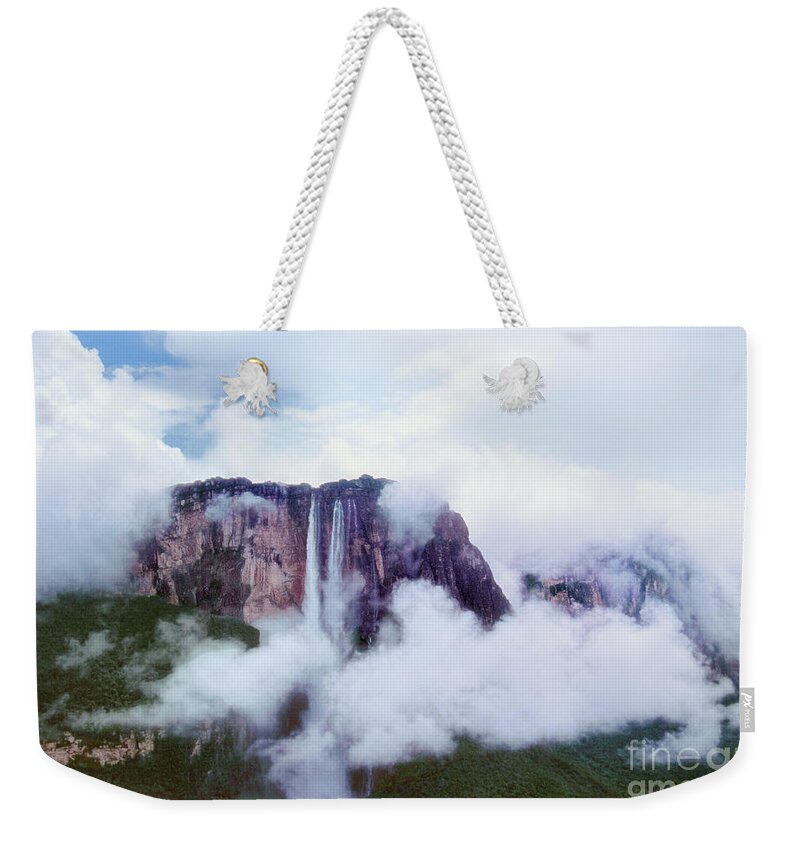 Dave Welling Weekender Tote Bag featuring the photograph Clouds Cover Angel Falls In Canaima Np Venezuela by Dave Welling
