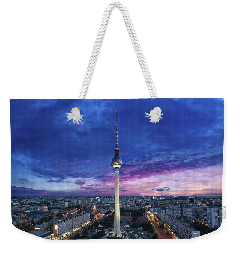 Berlin Weekender Tote Bag featuring the photograph Colored Evening Sky Over Berlin by @by Feldman 1