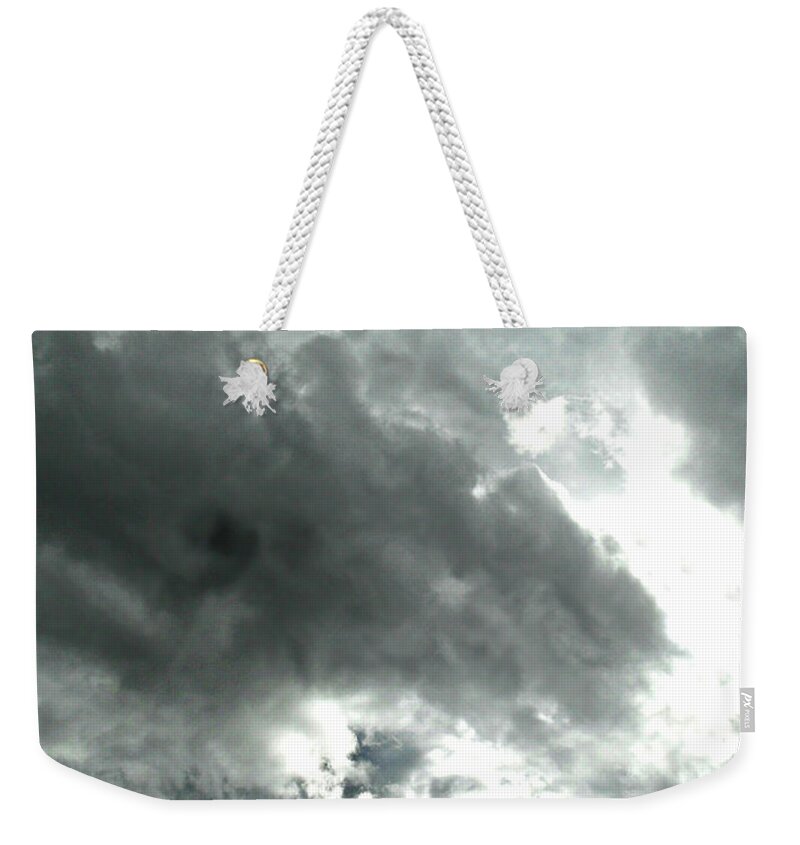 Colossal Covering Weekender Tote Bag featuring the photograph Colossal Covering by Cyryn Fyrcyd