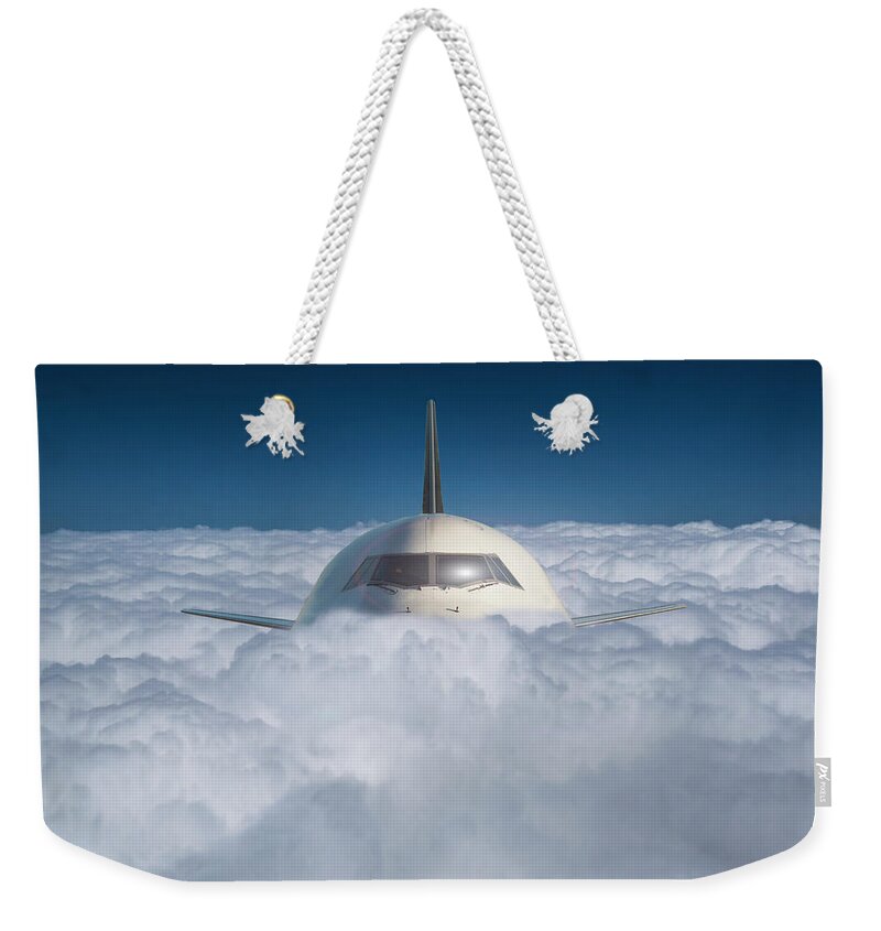 Risk Weekender Tote Bag featuring the photograph Commercial Jet In A Sea Of Clouds by Buena Vista Images
