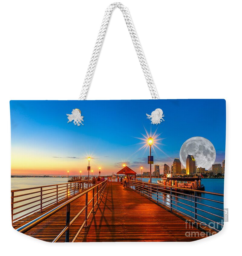 San Diego Weekender Tote Bag featuring the photograph Coronado pier with full moon by Benny Marty