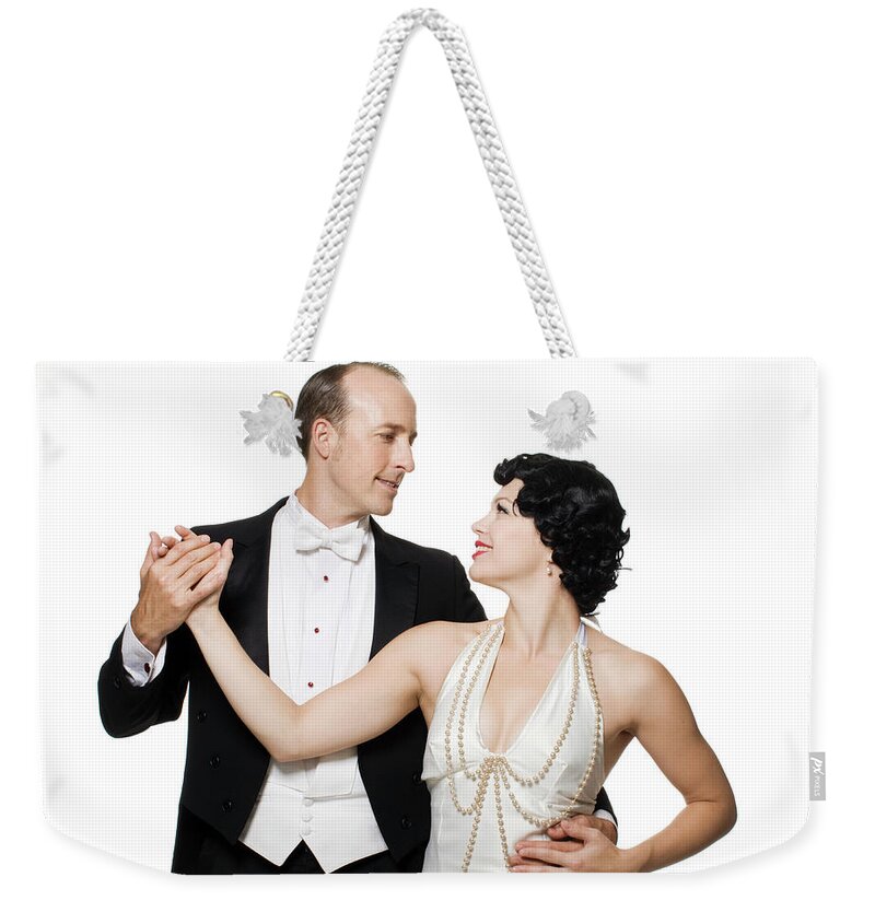 Heterosexual Couple Weekender Tote Bag featuring the photograph Couple Posing In Dance 1920s Fashion by Allison Michael Orenstein