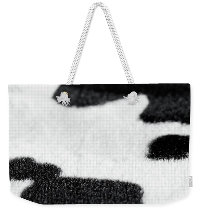 Animal Skin Weekender Tote Bag featuring the photograph Cow Fur Fabric Detail by Photovideostock