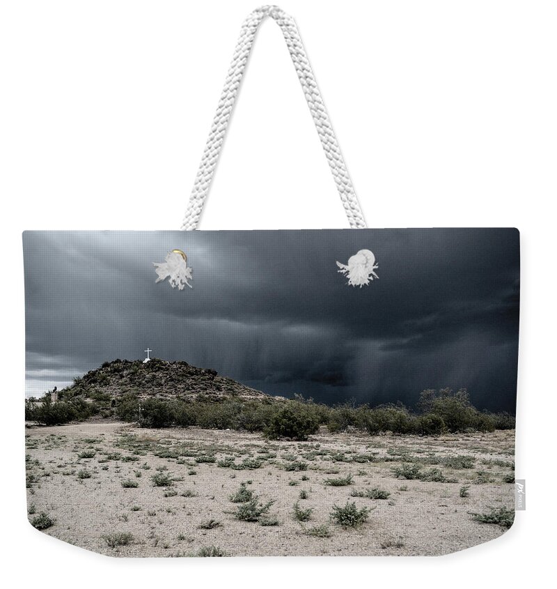 Tucson Weekender Tote Bag featuring the photograph Cross on a Hill by Chance Kafka