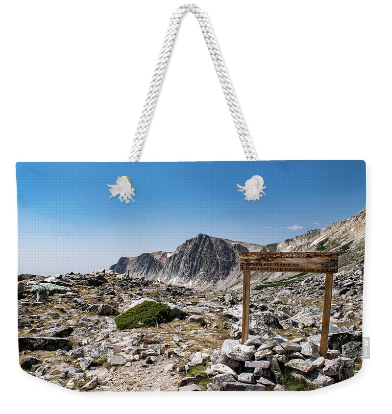 Landscape Weekender Tote Bag featuring the photograph Crossroads at Medicine Bow Peak by Nicole Lloyd