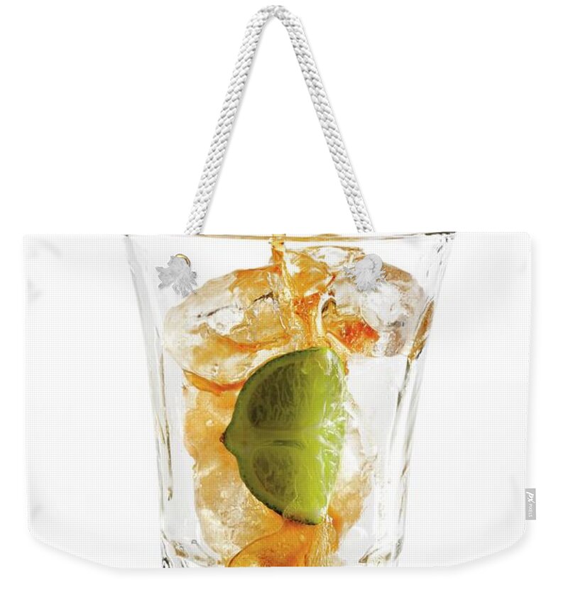 White Background Weekender Tote Bag featuring the photograph Cuba Libre Drink, Close-up by Creativ Studio Heinemann