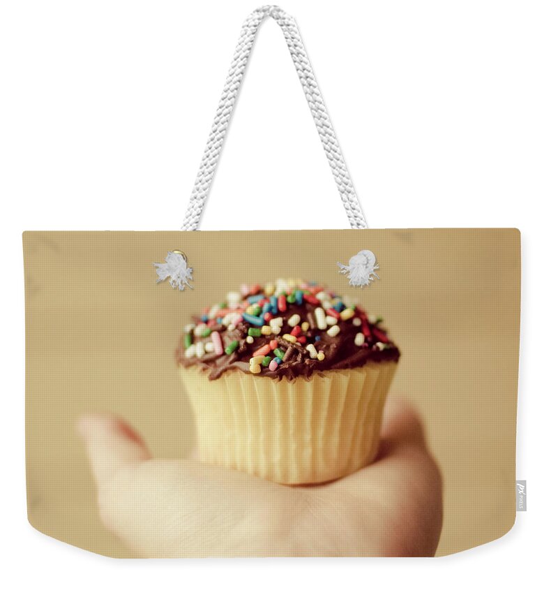 Child Weekender Tote Bag featuring the photograph Cupcake by Lauren Marek