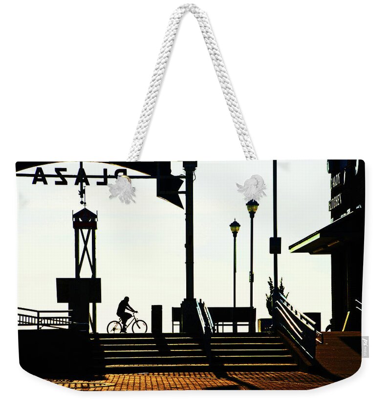 Bicycle Weekender Tote Bag featuring the photograph Cyclist at sunrise, Ocean City boardwalk by Bill Jonscher
